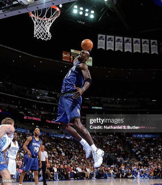 Kevin Garnett of the Minnesota Timberwolves dunks the ball during the NBA game against the Denver Nuggets at Pepsi Center on January 26, 2004 in...