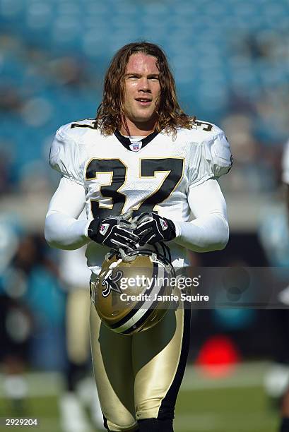 Safety Steve Gleason of the New Orleans Saints walks on the field before the start of the game against the Jacksonville Jaguars on December 21, 2003...