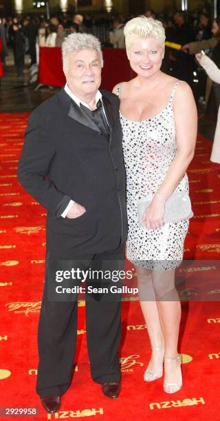 Actor Tony Curtis and his wife Jill Ann Curtis attend the Goldene Kamera Film Awards on February 4, 2004 in Berlin, Germany.