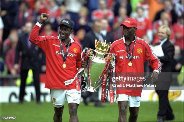 Dwight Yorke and Andy Cole celebrate after the FA Carling Premiership match between Manchester United v Tottenham Hotspur at Old Trafford on May 16,...