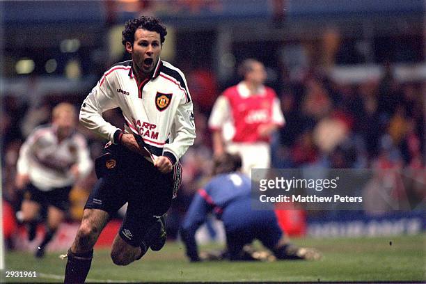 Ryan Giggs celebrates scoring a magnificent winning goal for United as they defeat Arsenal 2-1 in extra time during the 1999 FA Cup Semifinal Replay...