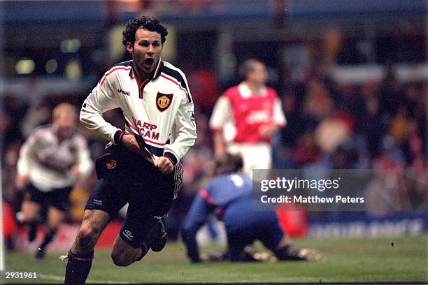 Ryan Giggs celebrates scoring a magnificent winning goal for United as they defeat Arsenal 2-1 in extra time during the 1999 FA Cup Semifinal Replay...