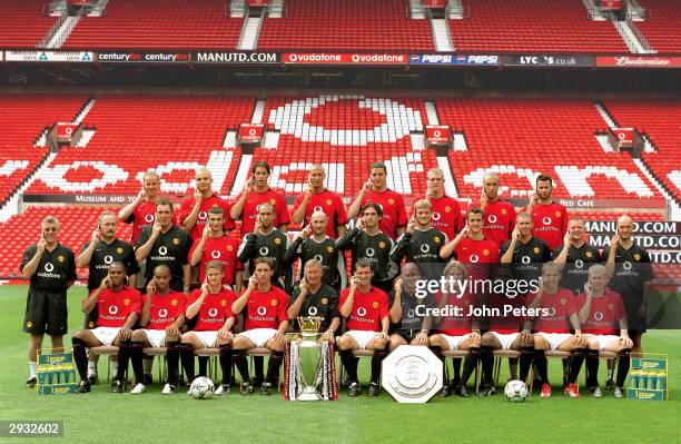 The Manchester United squad lines up for the 2003/04 team photocall. Back row : Nicky Butt, Wes Brown, Ruud van Nistelrooy, Rio Ferdinand, John...