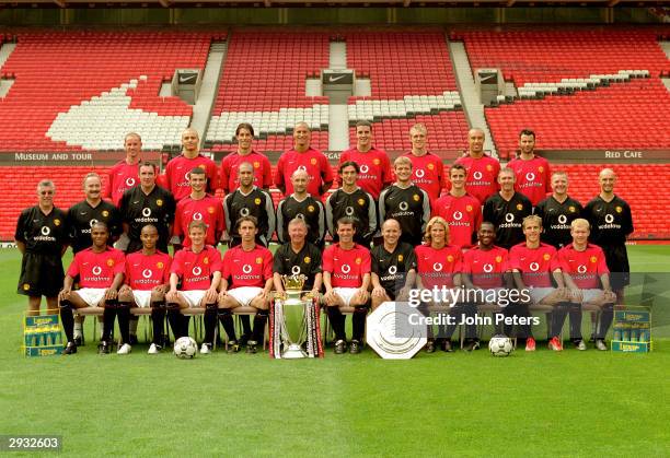 The Manchester United squad lines up for the 2003/04 team photocall. Back row : Nicky Butt, Wes Brown, Ruud van Nistelrooy, Rio Ferdinand, John...