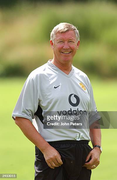 Sir Alex Ferguson of Manchester United returns to during pre season training at the Carrington Training Ground on July 8, 2003 in Manchester, England.