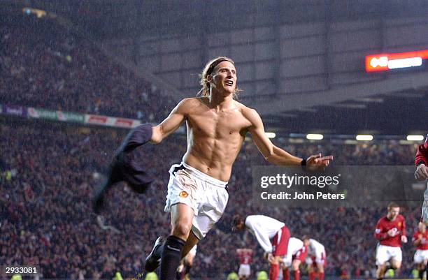 Diego Forlan celebrates his wining goal for Man Utd by removing his shirt during the FA Barclaycard Premiership match between Manchester United v...