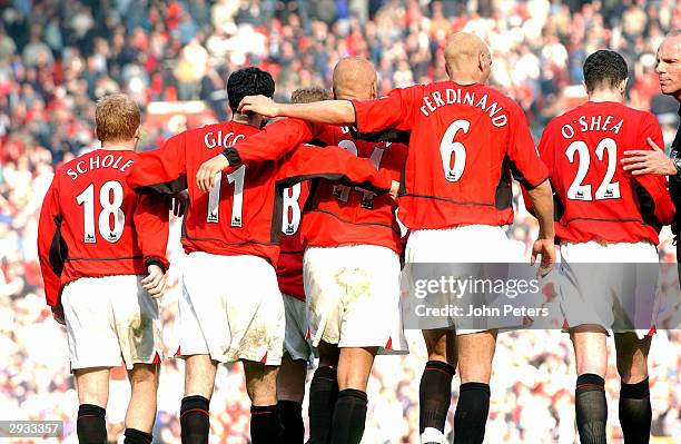From Paul Scholes, Ryan Giggs, Nicky Butt, Wes Brown, Rio Ferdinand and John O'Shea all celebrate Ruud van Nistelrooy's third goal during the FA...
