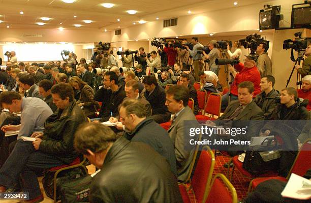 Journalists, Photographers and TV Crews record the press conference prior to the UEFA Champions League match between Manchester United v Juventus at...