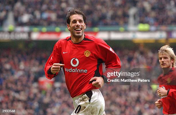 Ruud van Nistelrooy celebrates scoring Manchester United's third goal of the match while David Beckham runs to join him during the FA Cup 4th Round...