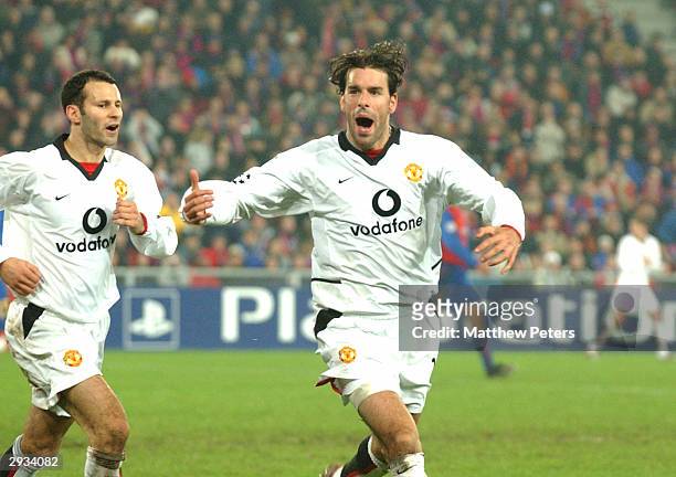 Ruud Van Nistelrooy celebrates with Ryan Giggs after scoring the equalising goal for Man Utd during the UEFA Champions League Group D match between...