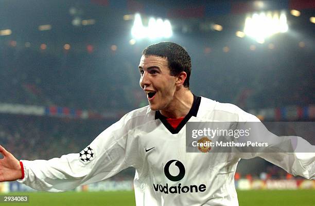 John O'Shea celebrates Ruud Van Nistelrooy's second goal of the match during the UEFA Champions League Group D match between FC Basel v Manchester...