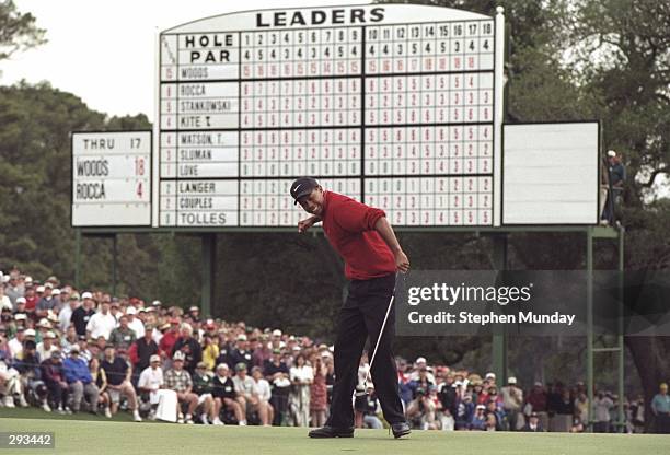 Tigers Woods hits a four foot putt on the 18th hole to win the Masters Tournament at the Augusta National Golf Course in Augusta, Georgia. Mandatory...