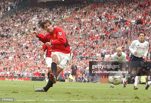 Ruud van Nistelrooy scores from the penalty spot during the FA Barclaycard Premiership match between Manchester United v Tottenham Hotspur at Old...