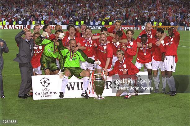 The Manchester United team celebrate after winning the European Cup in the UEFA Champions League Final match between Bayern Munich v Manchester...