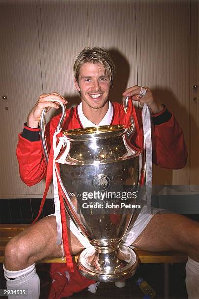 David Beckham with the European Cup in the dressing room after the UEFA Champions League Final between Bayern Munich v Manchester United at the Nou...