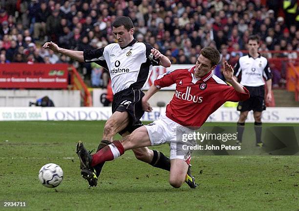 Roy Keane holds off Charlton's midfielder Scott Parker during the FA Barclaycard Premiership match between Charlton Athletic v Manchester United at...