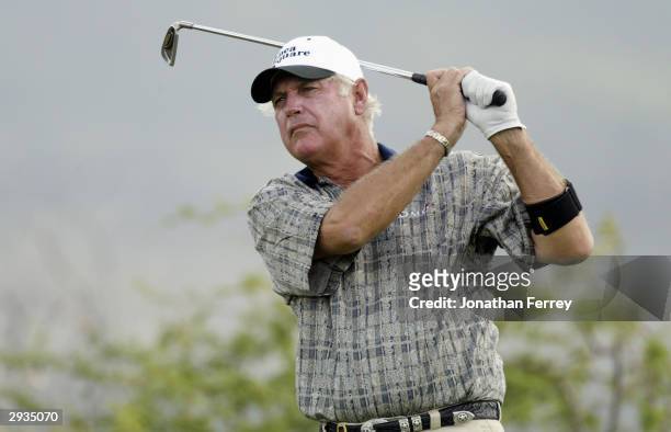 John Jacobs hits a shot during the first round of the Champions Tour Mastercard Championship on January 23, 2004 at the Hualalai Golf Club in...