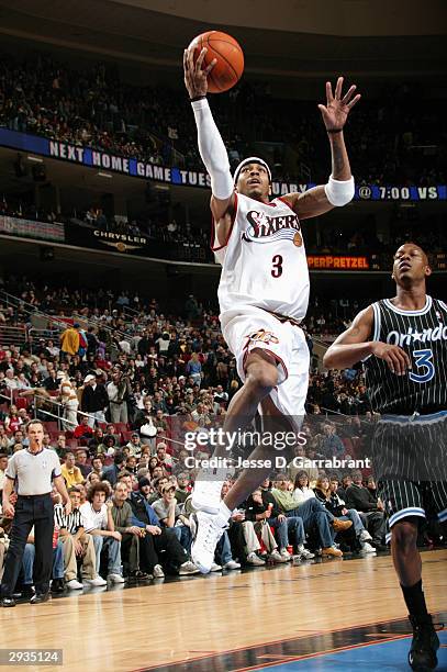 Allen Iverson of the Philadelphia 76ers drives to the basket during the game against the Orlando Magic at Wachovia Center on January 23, 2004 in...