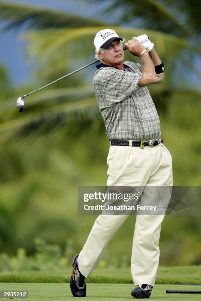 John Jacobs hits a shot during the first round of the Champions Tour Mastercard Championship on January 23, 2004 at the Hualalai Golf Club in...