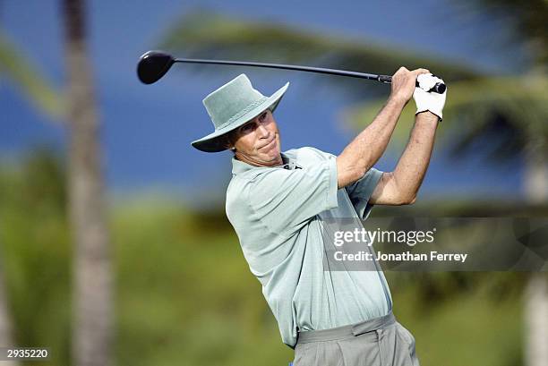 Hubert Green hits a shot during the first round of the Champions Tour Mastercard Championship on January 23, 2004 at the Hualalai Golf Club in...