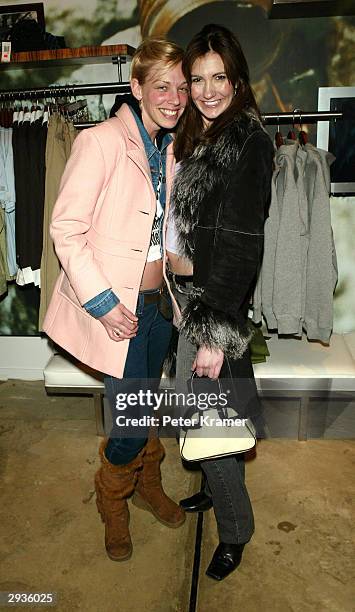 Models Ami Quinn and Diana Good attend the Original Penguin store opening February 05, 2004 in New York City.