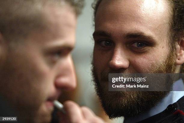 Fashion designer Frazer Harmon prepares for the runway backstage during the Harmon Fall 2004 fashion show at MAO/Atlas during the Olympus 2004...