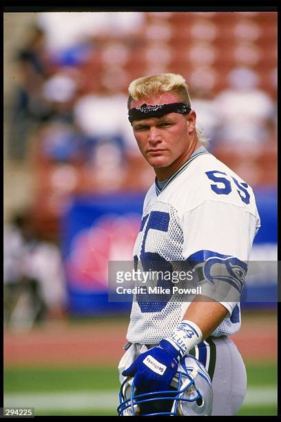 Linebacker Brian Bosworth of the Seattle Seahawks looks on during a game against the Los Angeles Raiders at the Los Angeles Memorial Coliseum in Los...