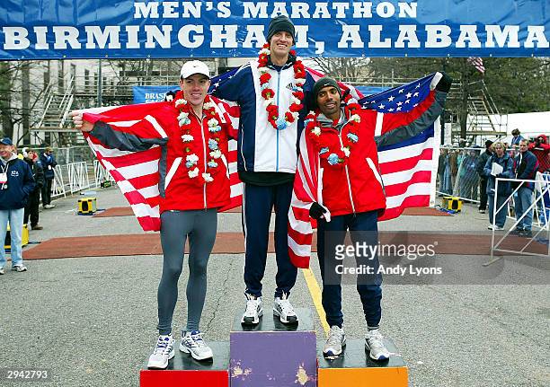 Dan Browne , Meb Keflezighi and Alan Culpepper are pictured on the winners' platform following the U.S. Olympic Marathon Trials on February 7, 2004...