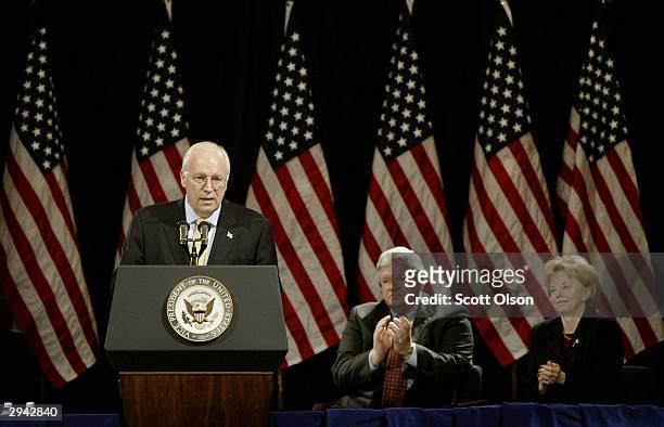 Vice President Dick Cheney receives applause from Speaker of the House Dennis Hastert and Cheney's wife Lynne during a speech delivered at a...