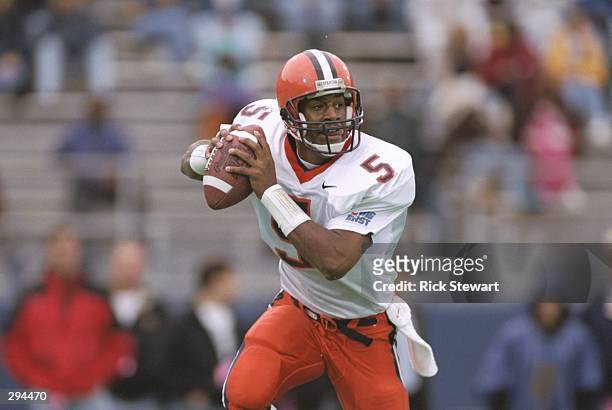 Quarterback Donovan McNabb of the Syracuse Orangemen drops to pass during a game against the Pittsburgh Panthers at Pitt Stadium in Pittsburgh,...