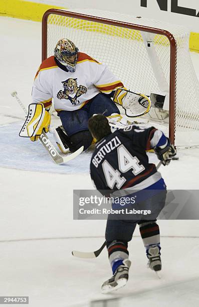 Todd Bartuzzi of the Vancouver Canucks takes a shot against Roberto Luongo of the Florida Panthers during the "In The Zone" competition in the NHL...