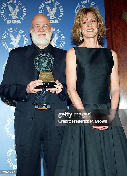 Winner of the Robert B. Aldrich award Jeremy Kagan and Actress Christine Lahti pose backstage at the 56th Annual DGA Awards at the Century Plaza...