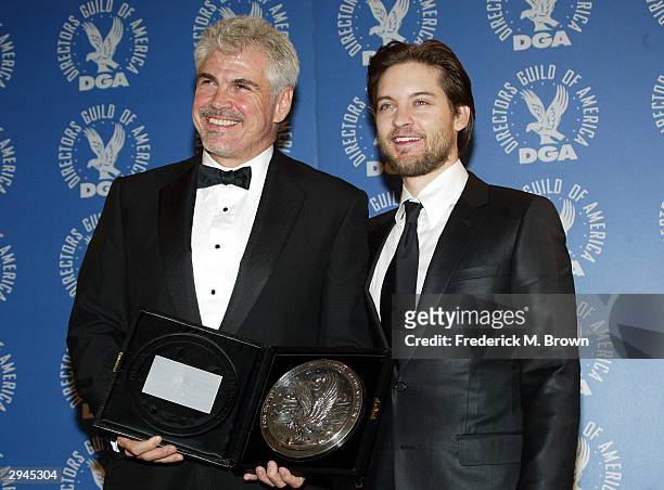 Director Gary Ross and Actor Tobey Maguire pose backstage at the 56th Annual DGA Awards at the Century Plaza Hotel on February 7, 2004 in Beverly...