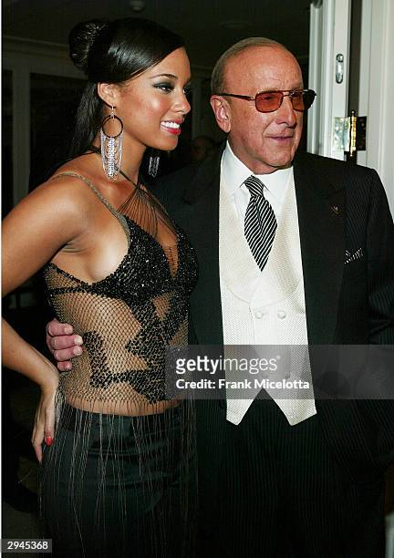 Singer Alicia Keys and music mogul Clive Davis attend Clive Davis' legendary Pre-Grammy party at the Beverly Hills Hotel on February 7, 2004 in...