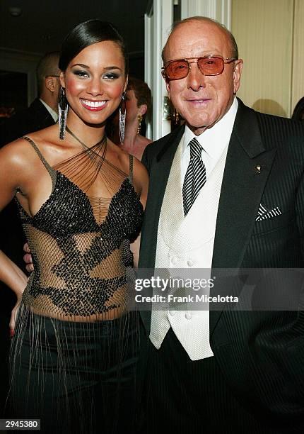 Singer Alicia Keys and music mogul Clive Davis attend Clive Davis' legendary Pre-Grammy party at the Beverly Hills Hotel on February 7, 2004 in...