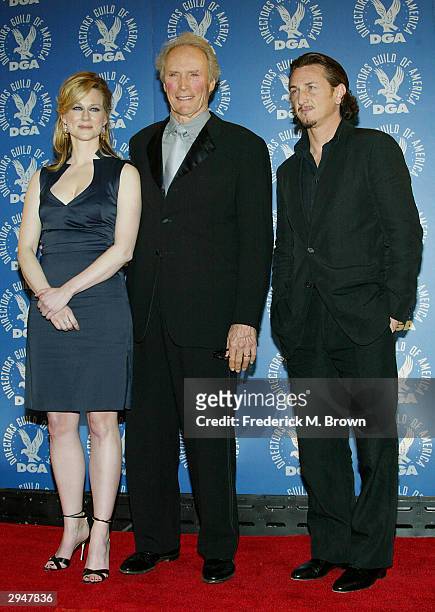 Actress Laura Linney poses with actor's and director's Clint Eastwood and Sean Penn backstage at the 56th Annual DGA Awards at the Century Plaza...