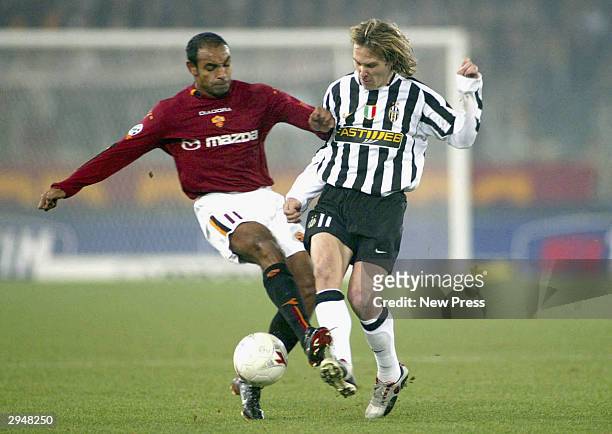 Emerson of Roma and Pavel Nedved of Juventus in action during the Serie A match Between Roma and Juventus at the Stadio Olimpico on February 8, 2004...