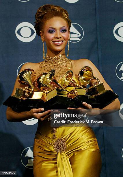 Singer/actress Beyonce Knowles poses backstage after winning 5 Grammy Awards in the Pressroom at the 46th Annual Grammy Awards held on February 8,...