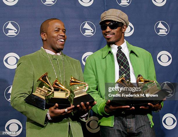 Musical Artists Big Boi and Andre 3000 of Oukast pose with their six Grammys backstage in the Pressroom at the 46th Annual Grammy Awards held on...