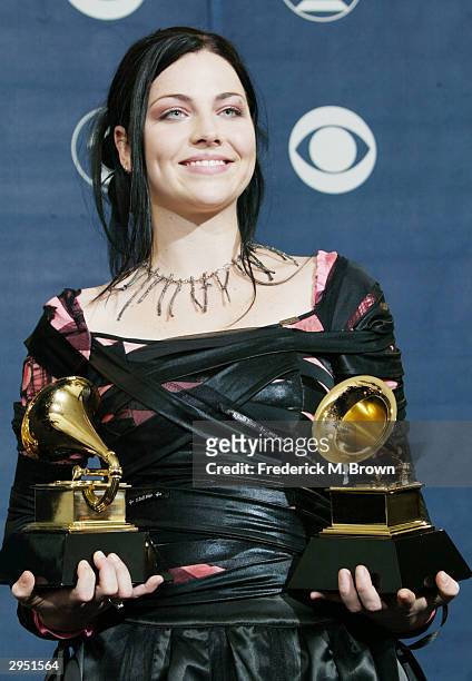 Singer Amy Lee of Evanescence poses with her two Grammys backstage in the Pressroom at the 46th Annual Grammy Awards held at the Staples Center on...