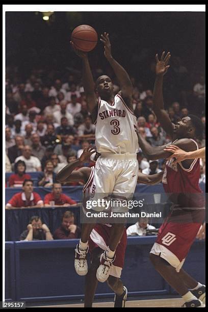 Guard Kris Weems of the Stanford Cardinal shoots the ball during a playoff game against the Oklahoma Sooners at the McKale Center in Tuscon, Arizona....