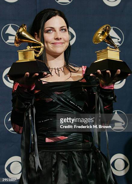 Singer Amy Lee of Evanescence poses backstage in the Pressroom at the 46th Annual Grammy Awards held at the Staples Center on February 8, 2004 in Los...