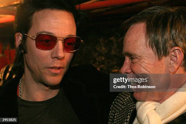 Fashion designers Tommy Hilfiger and Michael H attend the Michael H Fall 2004 fashion show during the Olympus Fashion Week Fall 2004 at Don Hills...