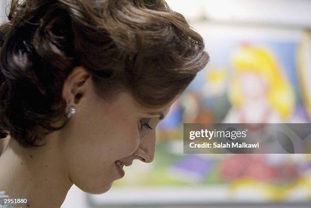 Asmaa al-Assad, wife of the Syrian President attends the first national childhood conference, February 8, 2004 in Aleppo in the north of Syria. The...