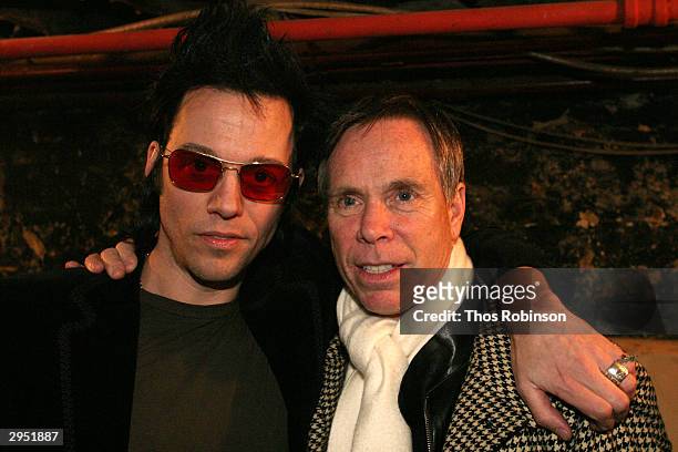 Fashion designers Tommy Hilfiger and Michael H attend the Michael H Fall 2004 fashion show during the Olympus Fashion Week Fall 2004 at Don Hills...
