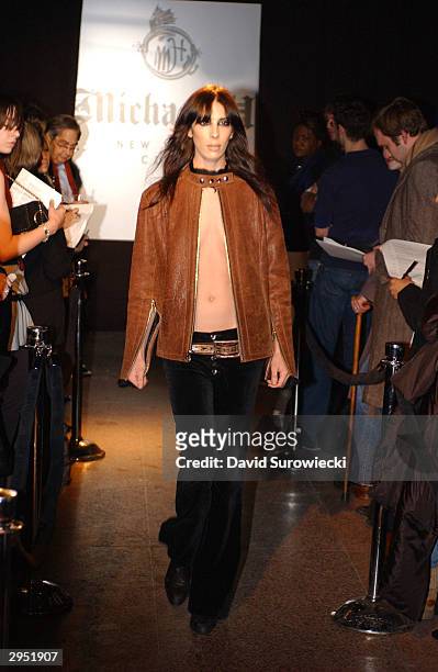 Model walks the runway at the Michael H Fall 2004 fashion show during the Olympus Fashion Week Fall 2004 at Don Hills February 8, 2004 in New York...