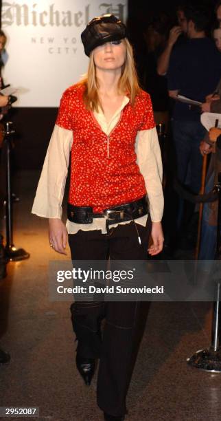 Model walks the runway at the Michael H Fall 2004 fashion show during the Olympus Fashion Week Fall 2004 at Don Hills February 8, 2004 in New York...