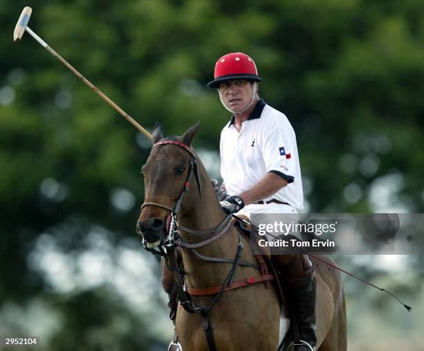 Actor Tommy Lee Jones plays polo at the International Polo Club Palm Beach on February 6, 2004 in Wellington, Florida.