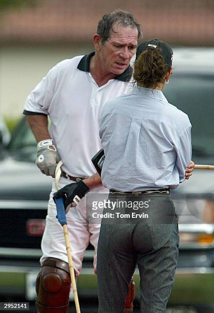 Actor Tommy Lee Jones chats between chukkers at the International Polo Club Palm Beach on February 6, 2004 in Wellington, Florida.