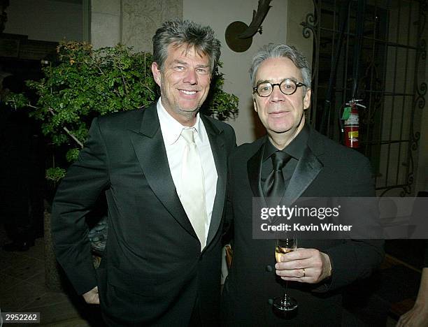 Composers David Foster and Howard Shore arrive at the Warner Music Group's Post-Grammy party at Katana on February 8, 2004 in West Hollywood,...